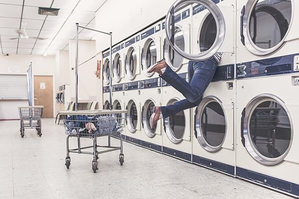 woman-jumping-in-laundry